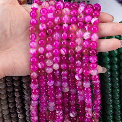 Flusso di perline di agata a strisce di fuchsia naturale per la fabbricazione di gioielli