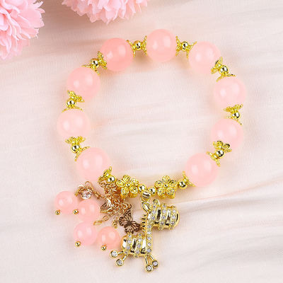 Braccialetto di perline rosa di quarzo da 12 mm con incantesimo di cervo