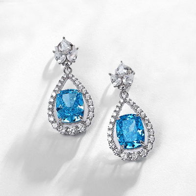 Eleganti orecchini di 925 Sterling Silver Rosa Gemstone Ovale Halo